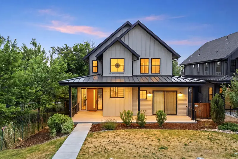 Modern farmhouse at dusk